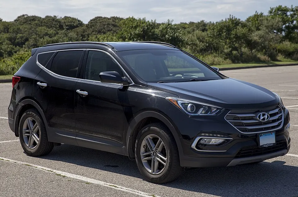 2018 Hyundai Santa Fe Sport 4WD in Becketts Black, front right, photographed in United States