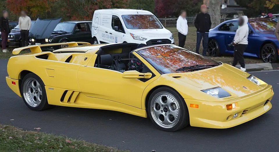 1999 Lamborghini Diablo VT Roadster in Giallo, front right, photographed in United States