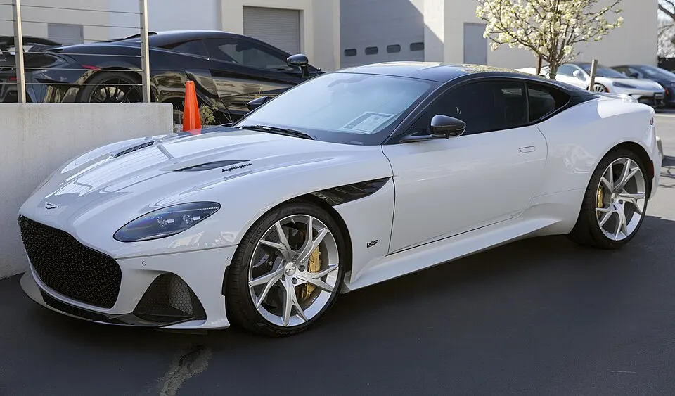 2019 Aston Martin DBS Superleggera in White Stone, front left, photographed in United States