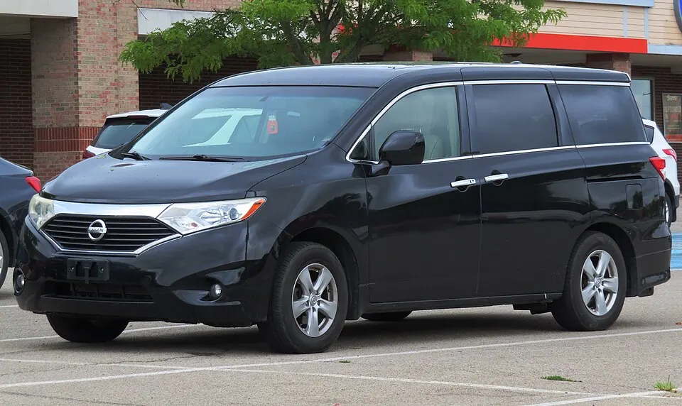 2015 Nissan Quest SV, front left, 08-25-2023, photographed in United States