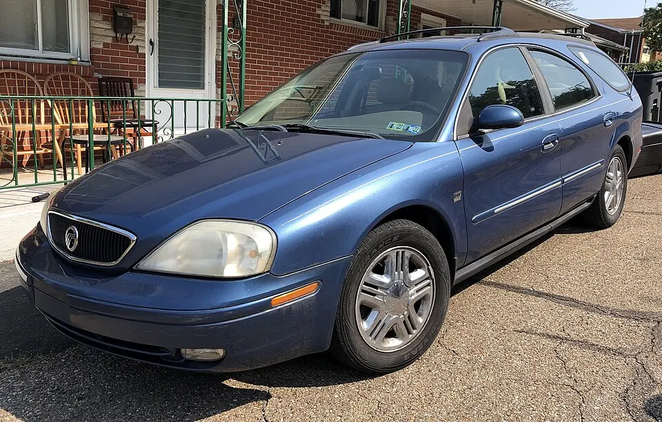 2002 Mercury Sable LS Premium wagon in French Blue Clearcoat Metallic, front left, 07-23-2021, photographed in United States