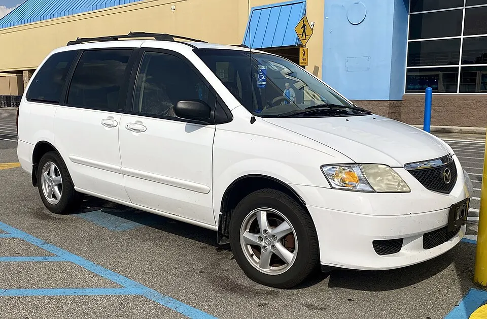 2003 Mazda MPV in Pure White, front right, 08-09-2023, photographed in United States