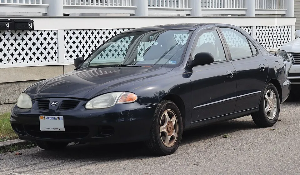 1999 Hyundai Elantra GL in Ebony Black, front left, 07-05-2026, photographed in United States