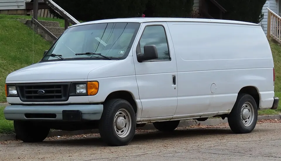 2004 Ford E-150 cargo van, front left, 11-24-2023, photographed in United States