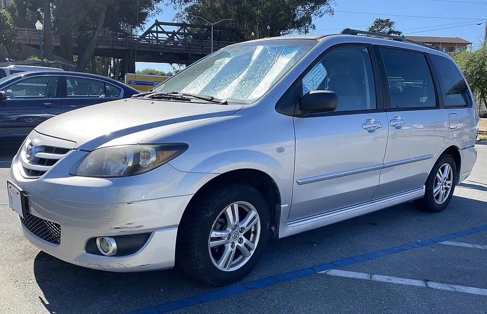 2005 Mazda MPV in Sunlight Silver Metallic, front left, 08-15-2022, photographed in United States