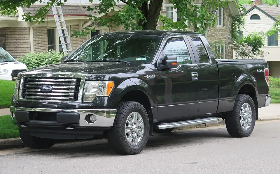 2012 Ford F-150 XLT in Tuxedo Black Metallic, front left, 05-20-2026, photographed in United States