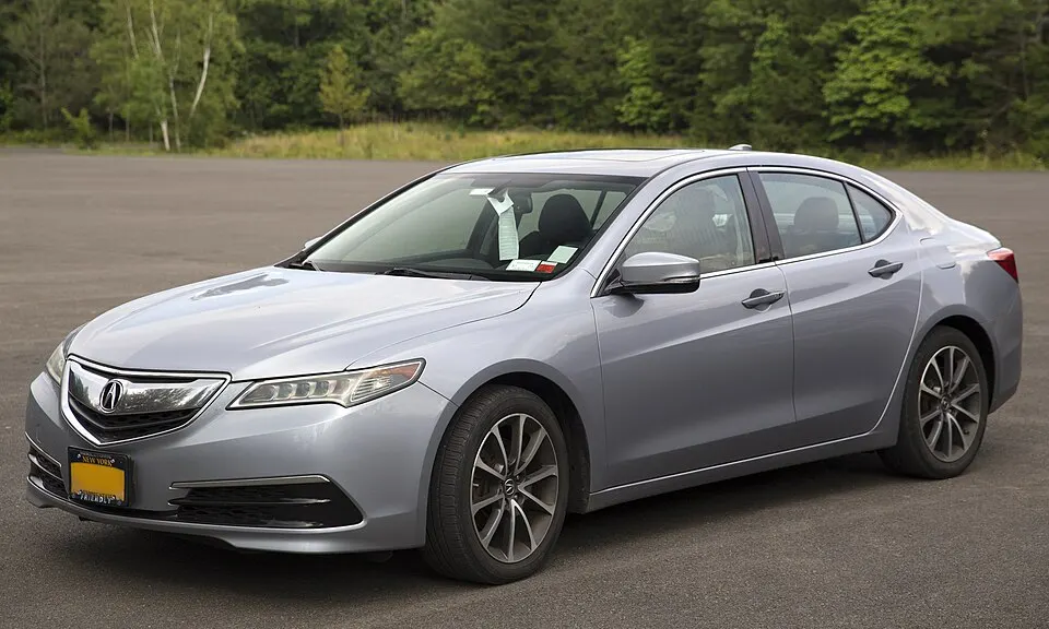 2016 Acura TLX V6 in Slate Silver Metallic, front left, photographed in United States