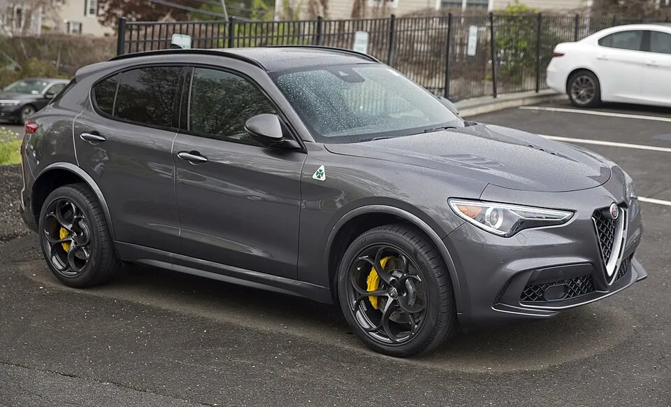 2019 Alfa Romeo Stelvio Quadrifoglio 4WD (Vesuvio Gray), front right, photographed in United States