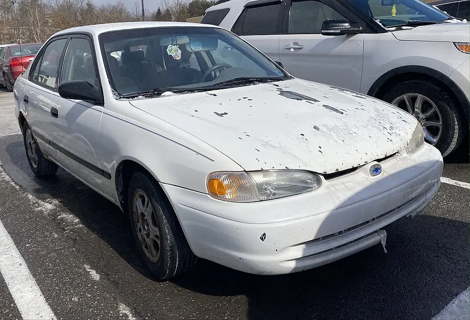 1999 Chevrolet Prizm LSi in White, front right, 2-19-2022, photographed in United States